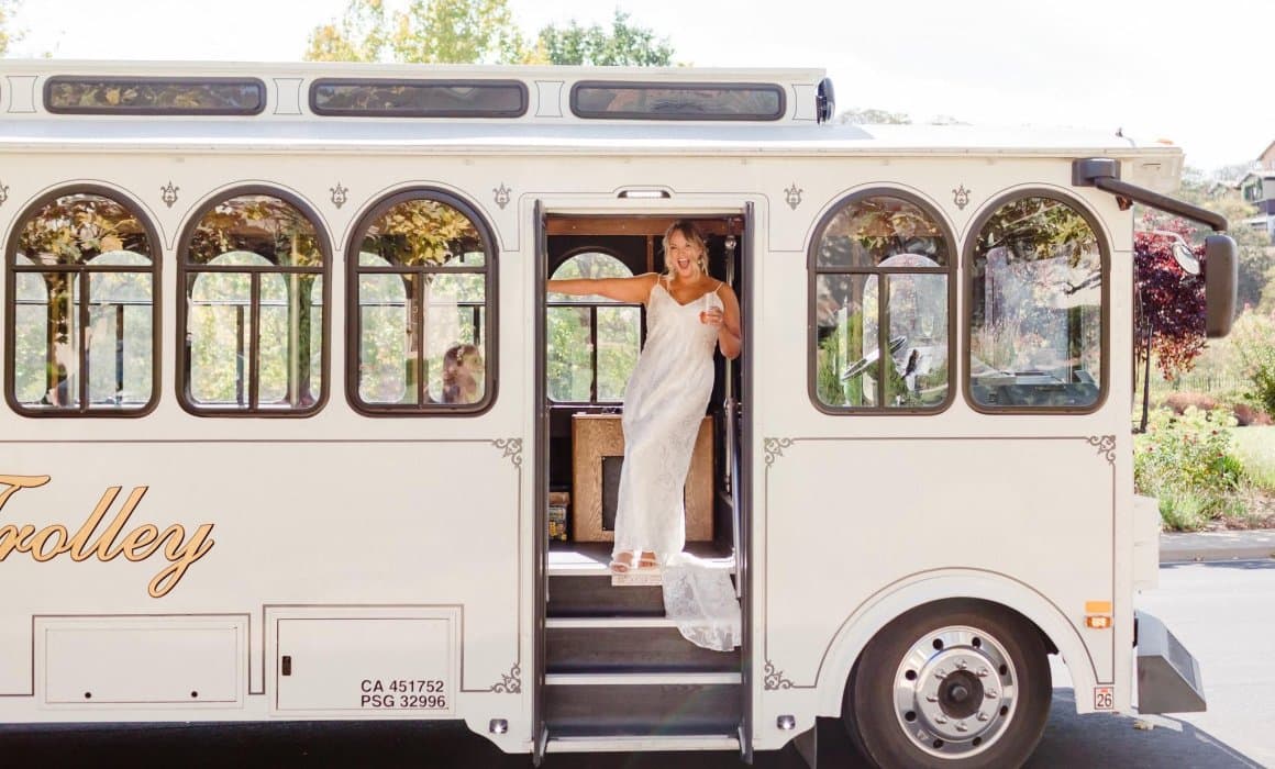 Bride stepping into the Golden State Trolley